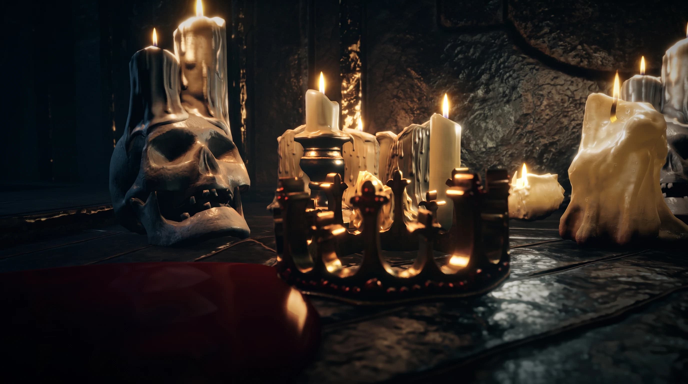 A crown surrounded by candles and carved skulls